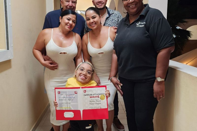 ESL program coordinator with one of the students who completed the basic and Level 1 (1)